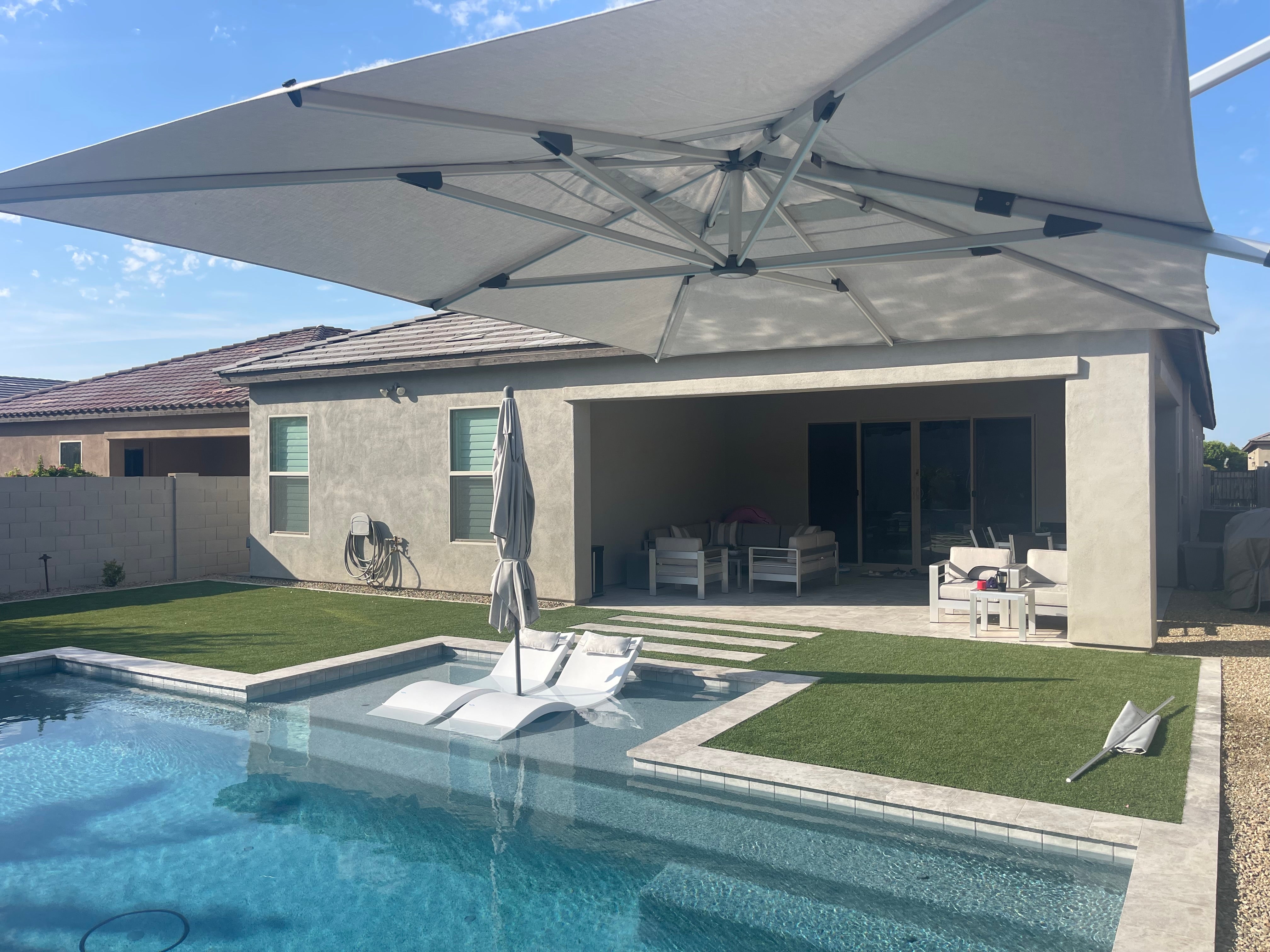 house mounted patio umbrella Polaris 340RT 10' x 13' Cantilever Umbrella – Stay Put Umbrellas