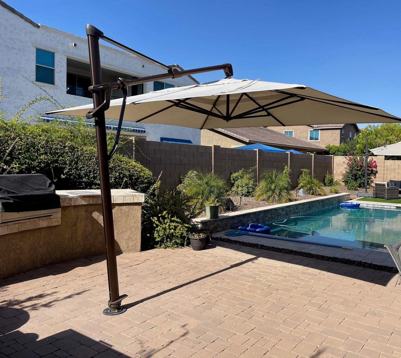 can you use a patio umbrella above pool 11.5 ft AKZP Cantilever Umbrella – Stay Put Umbrellas